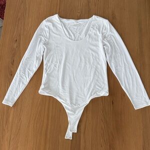 Nuuds large long sleeved body suit in white